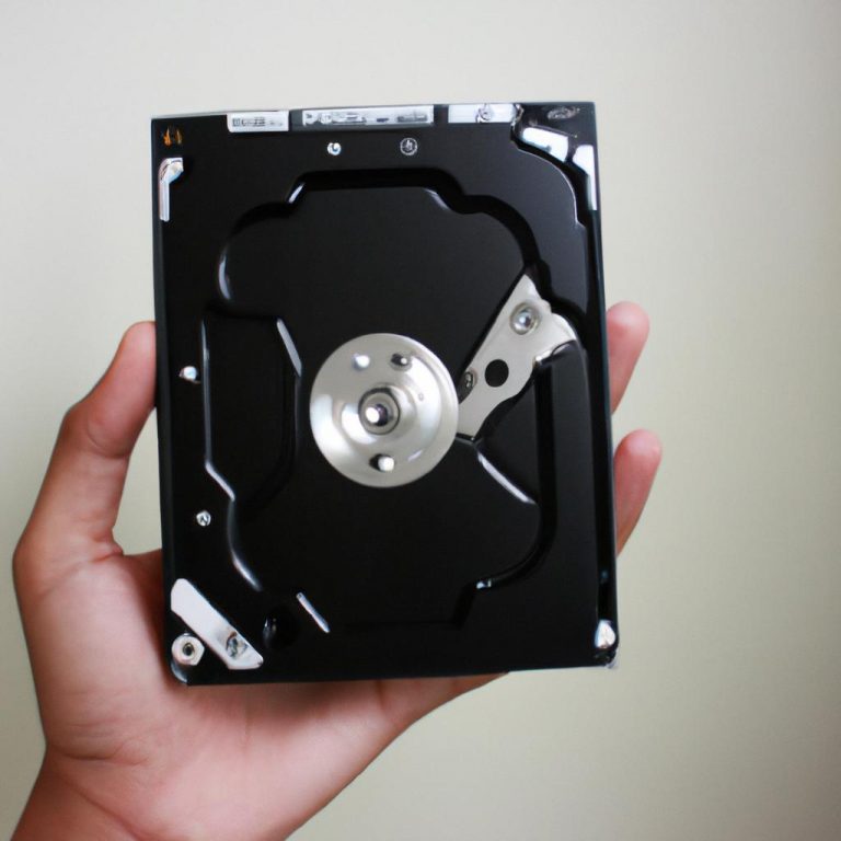 Person holding hard disk drive