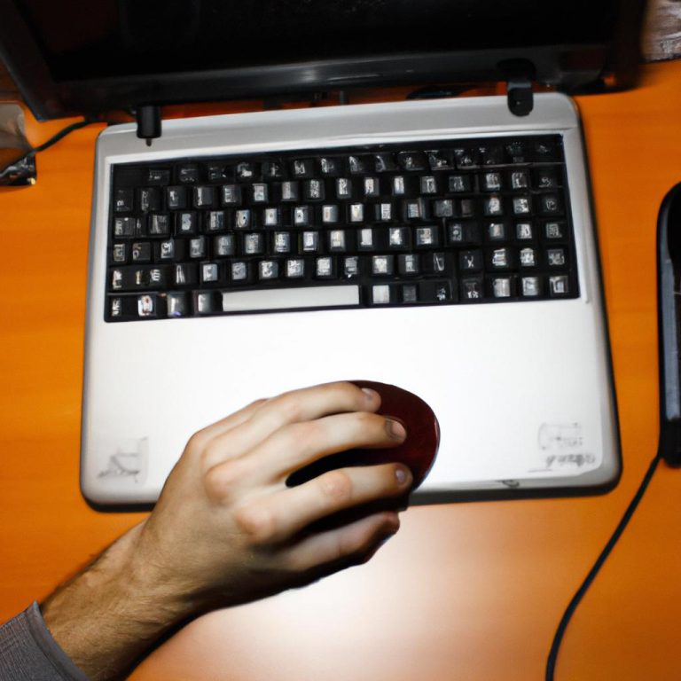 Person using computer and hardware
